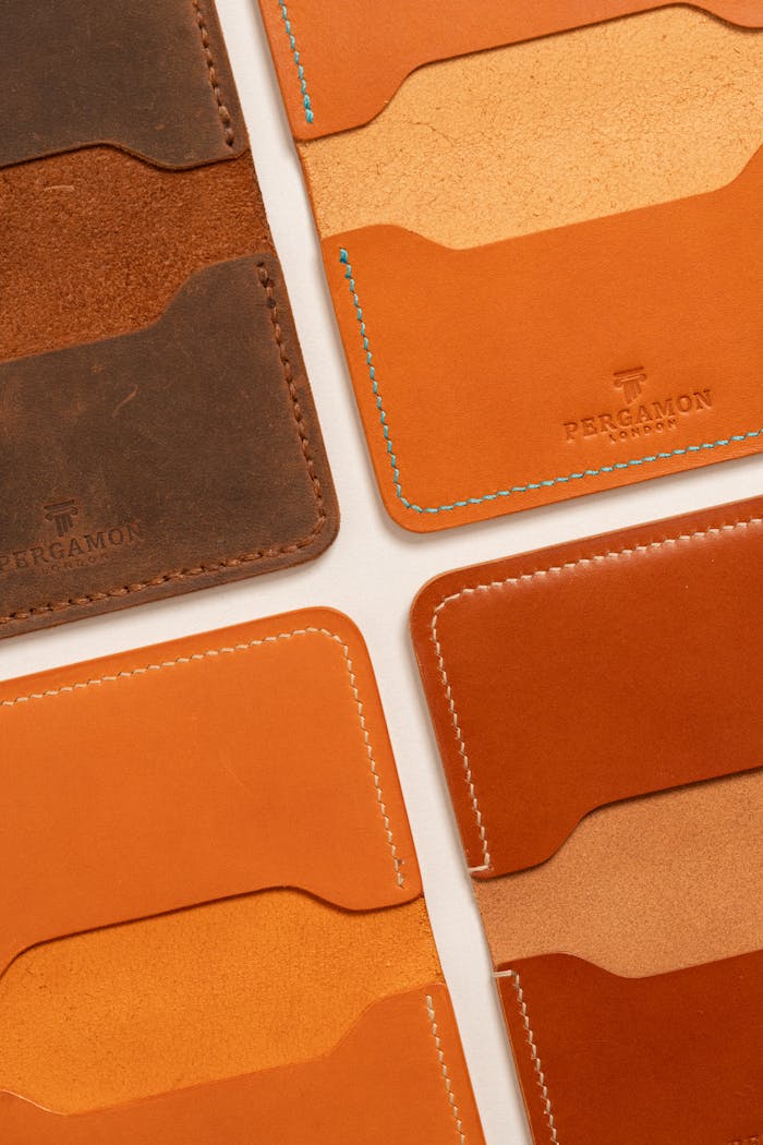 Top view of neatly arranged leather wallets showcasing craftsmanship and style.